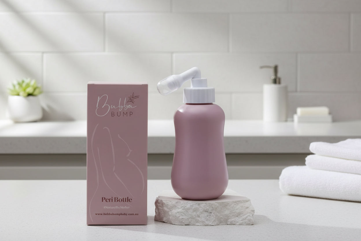 Purple peri bottle with packaging on a gray background